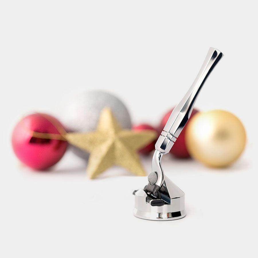 Eltham Mach3 Razor and Stand, set against Christmas decorations